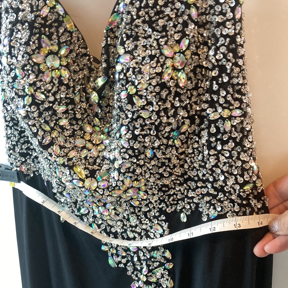 Long bejeweled black prom dress with thin straps and slit up to the thigh. - Picture 10 of 12